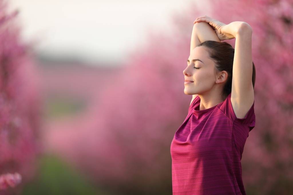 A thyroid RFA patient stretches blissfully after a run.